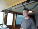 A VERY serious Tom at the helm