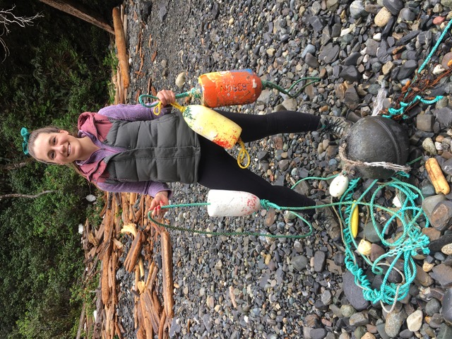 Tiare gathers floats and buoys to reclaim and paint on.