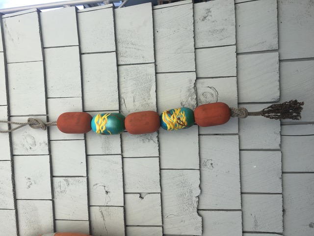 Rope with Tiare's painted buoys.