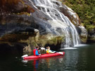 Kayaking Under Waterfalls